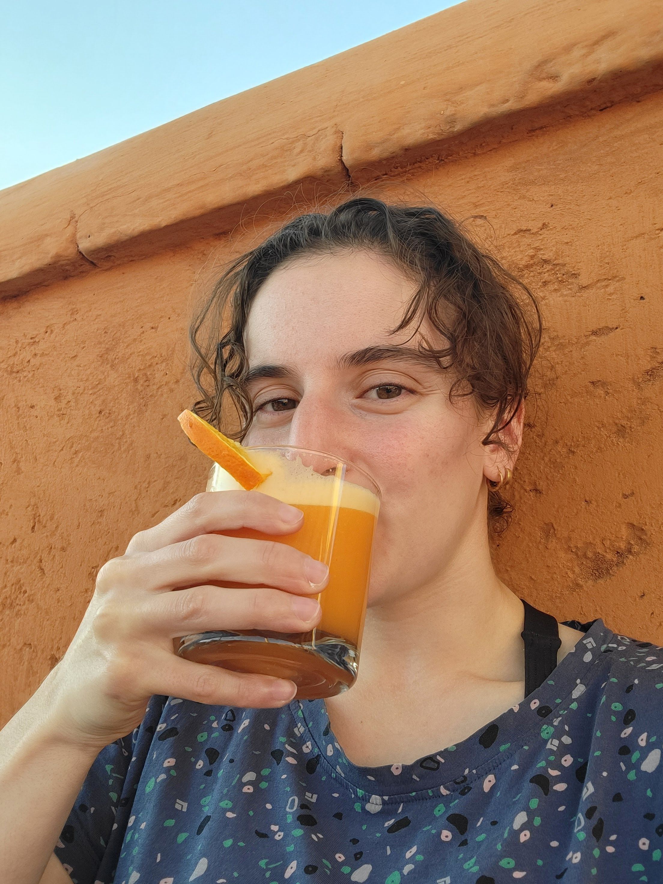 Danna sipping orange juice in Morocco
