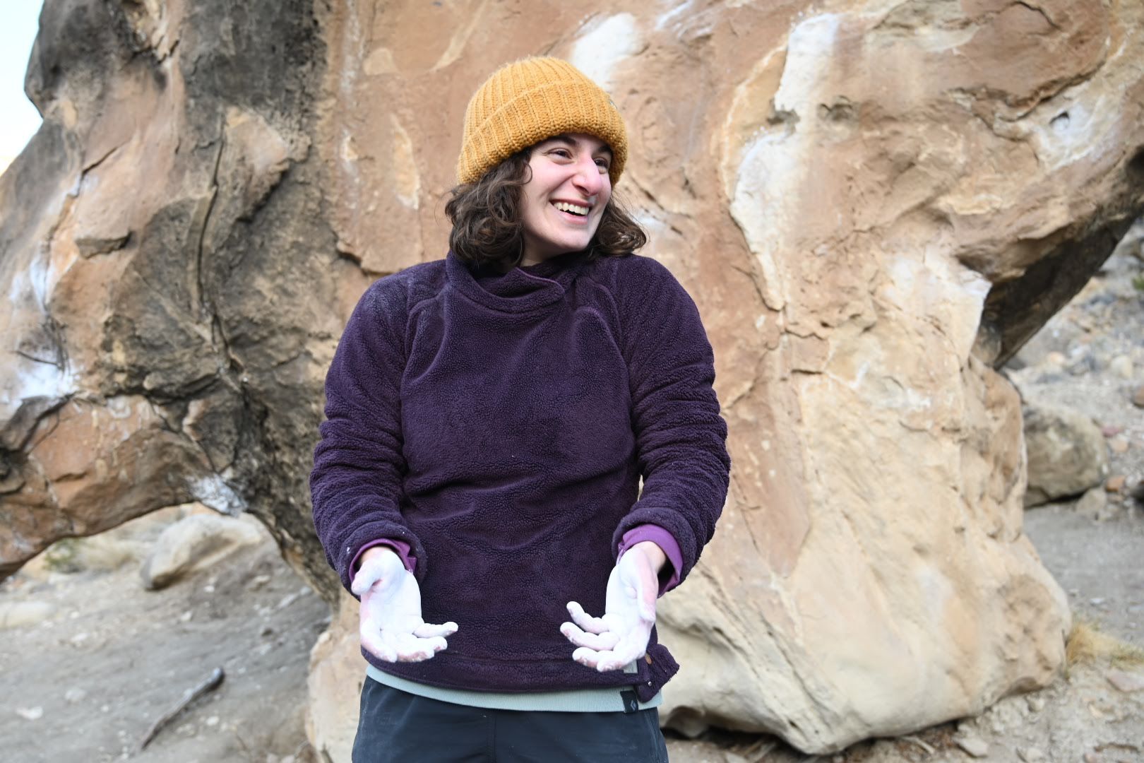 Danna with chalky hands from climbing